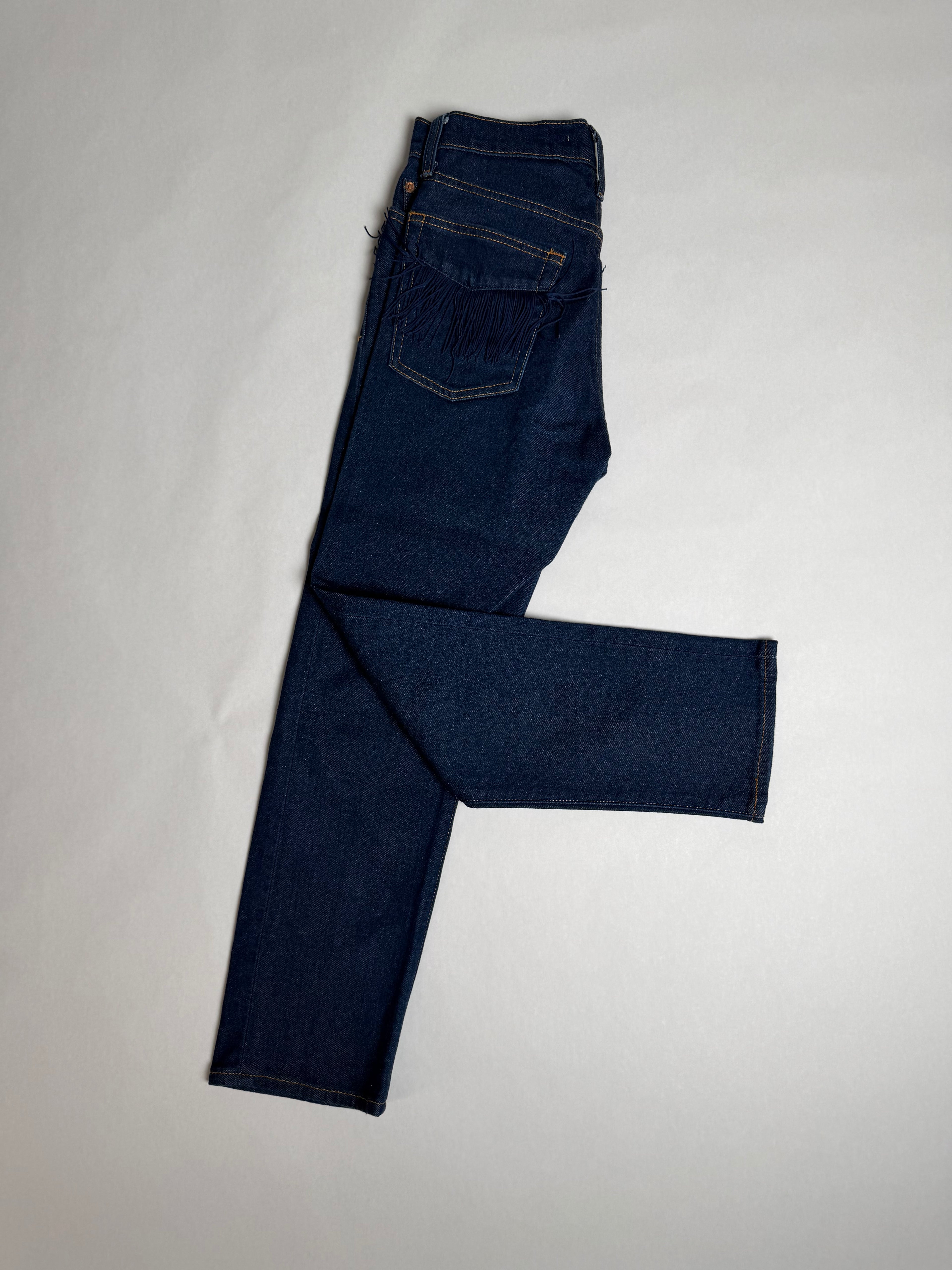 Levi's Premium Wedgie Straight dark indigo jeans with fringe pockets — folded back view